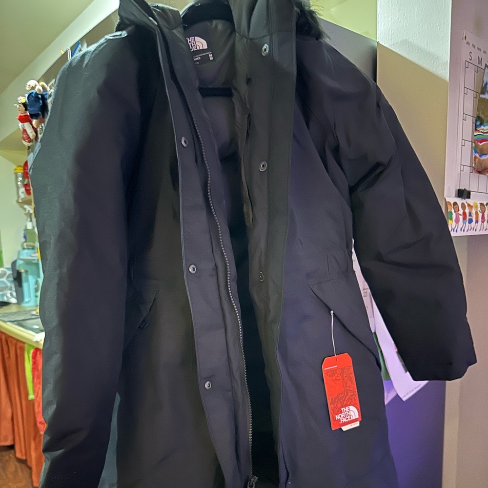 Brand new North Face women’s arctic parka black with tags black faux fur medium